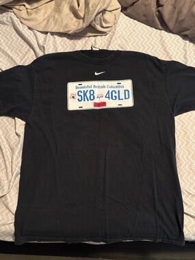 Vintage Nike Men’s World Juniors Vancouver 2006 Gold Metal T-Shirt Medium